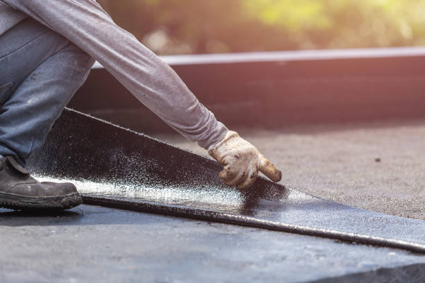 Professional Waterproofing technician working in Long Beach, MD